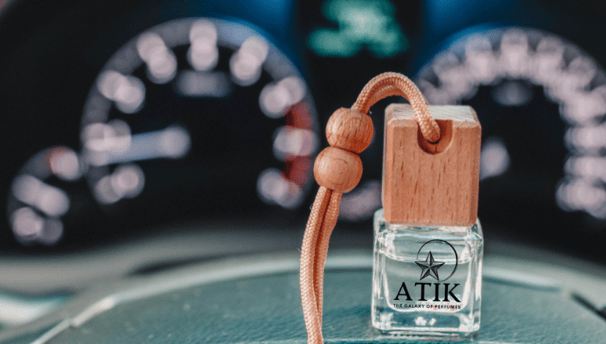 a bottle of refill air freshener for cars