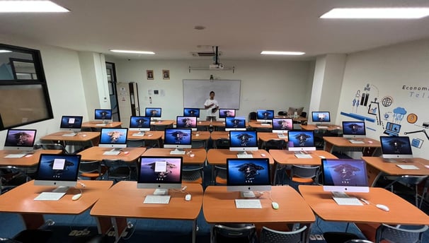 a classroom with a classroom desk and a classroom desk