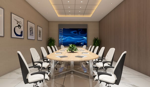 a conference room with a table and chairs