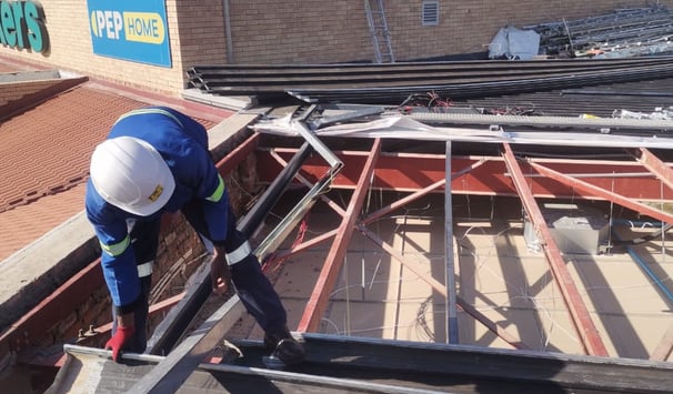 Environmental Pro Construction team replacing a roof structure on a commercial building in West Rand