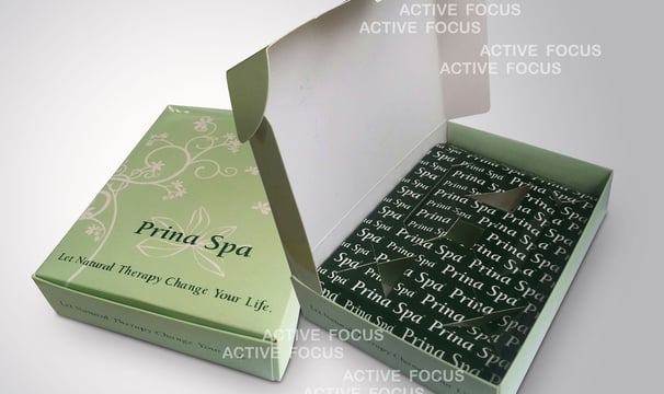 a box of printed paper with printed essential oil holder inside