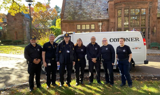 Coroner staff at Charles Evans Cemetary