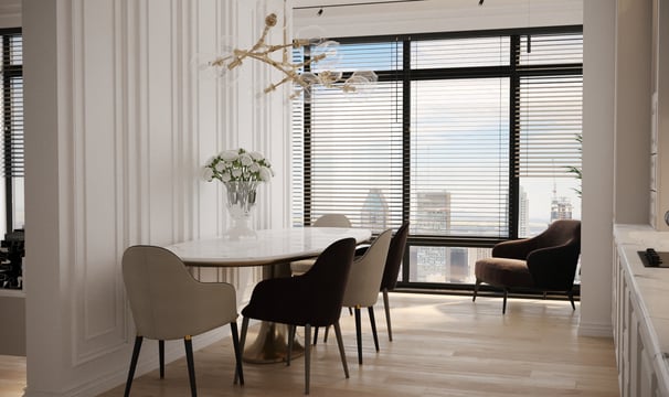 a dining room with a table and chairs