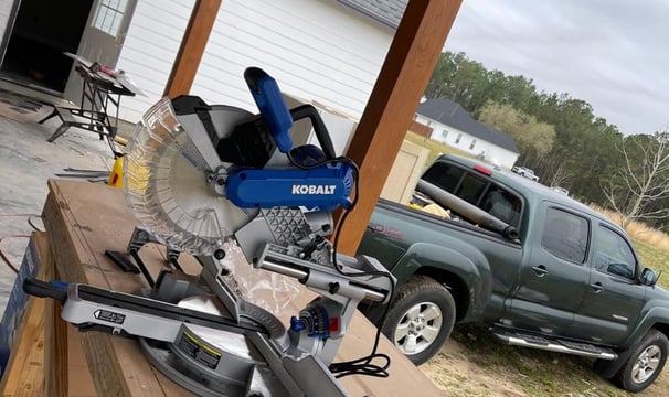 ofessional woodworking equipment set up for an outdoor carpentry project by Garnet Painting in Douglas, GA.