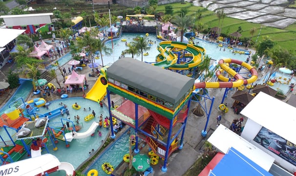 a water park with a water slider and a water slider