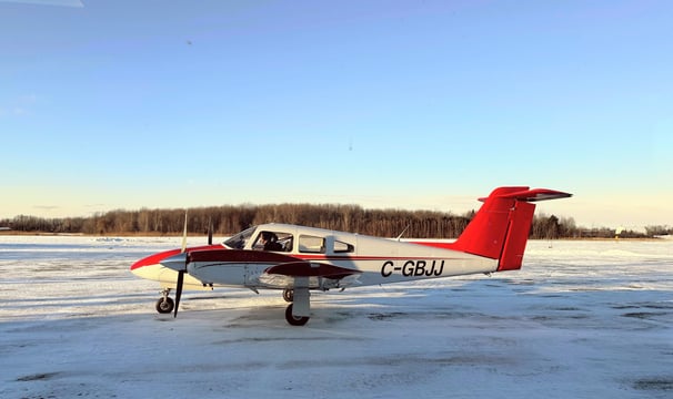 Picture of C-GBJJ, a PA44 shining in the golden hour