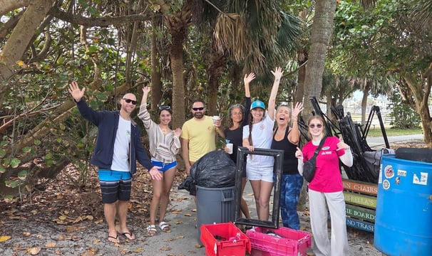 volunteers volunteering outside for a move into light initiative
