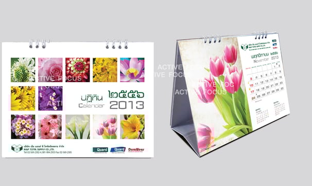 งานพิมพ์ปฎิทินตั้งโต๊ะ สำหรับปี 2013 มีรูปถ่ายดอกไม้ต่างๆ พิมพ์ด้วยสีเต็มรูปแบบ โดย Active Focus
