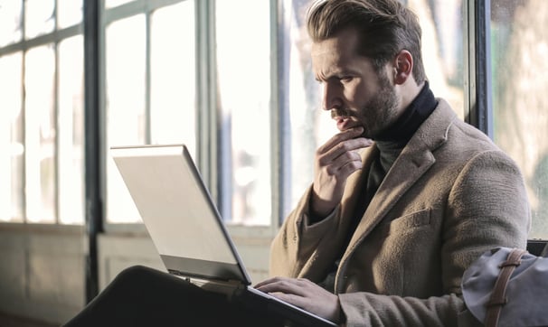 man using laptop