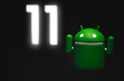 Google android bot with hands in the air and the number 11 glowing in the background