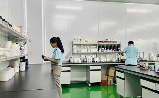 a woman in a lab coat and a man in a lab coat