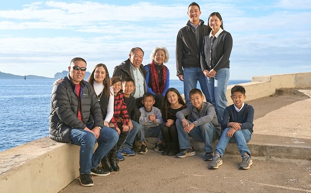 Family portrait along the Vieux Port with seaside background
