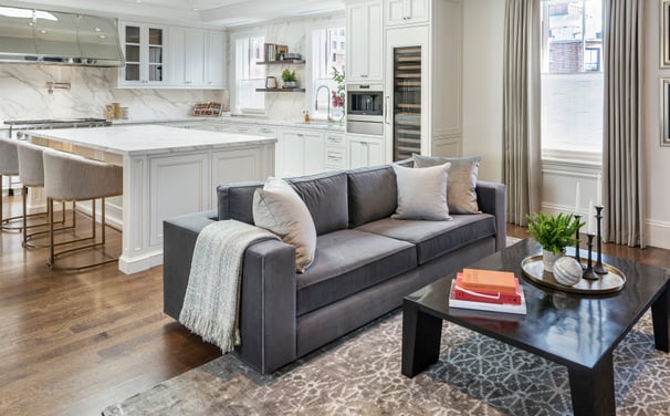 a living room with a couch and a table