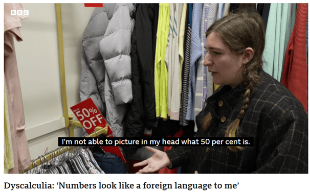 A young woman having difficulty understanding percentages of an item of clothing in a sale