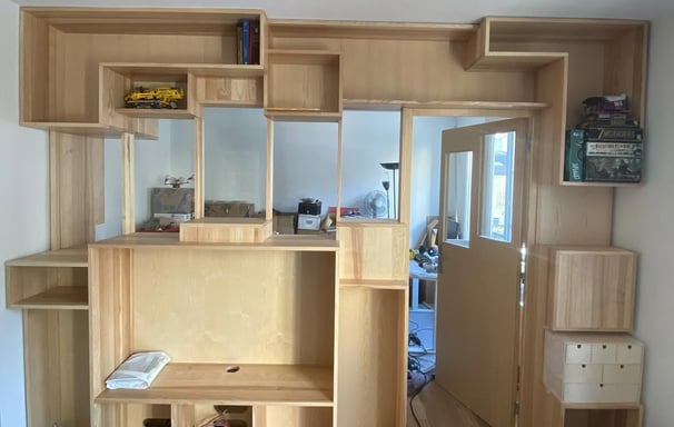 a room with a desk and a desk with a computer