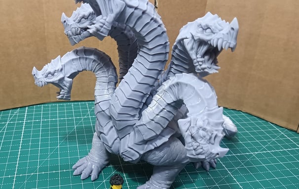 a series of photos of a dragon and a duck