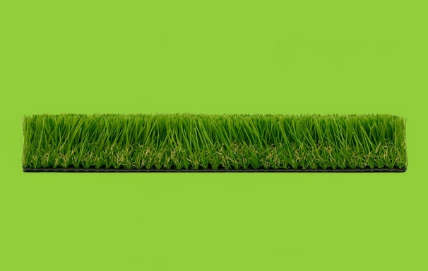 a green grass field with a green background