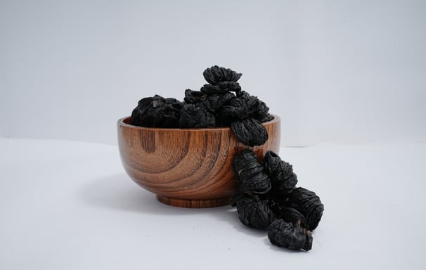 Malabar Tamarind Placed on a wooden Container