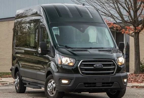 a black van parked in front of a building