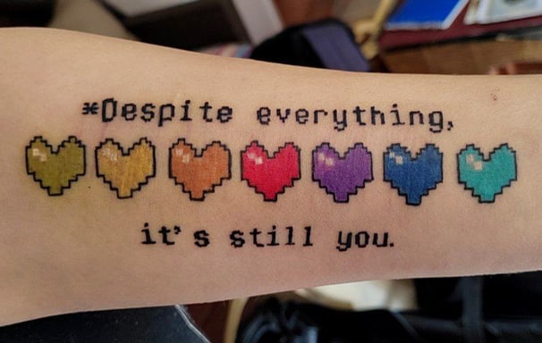 a tattoo of a quote on a person's arm