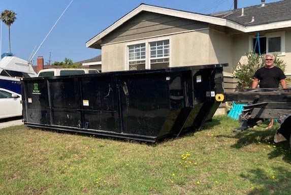 Our 18 cubic yard dumpster is ready for house junk cleanup