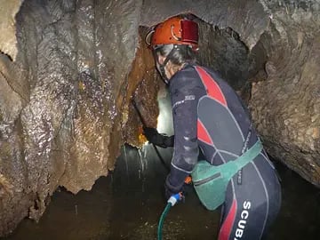 Clare Buswell Cleaning Cave formations after fire