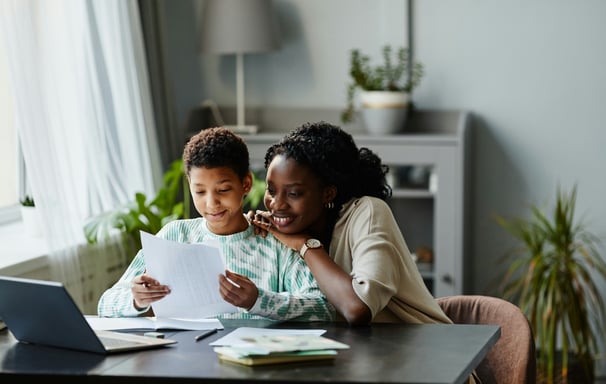 Happy mother after reading the chimhanda tutoring guide on how to help your child