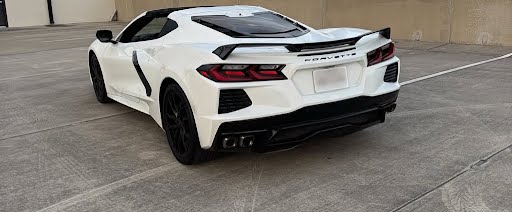 Rear view of 2023 Corvette 3LT with white paint and black trim