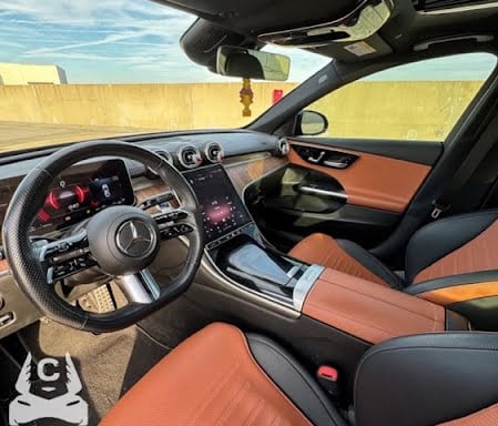 Mercedes C300 interior dashboard with leather seats and dual screen display