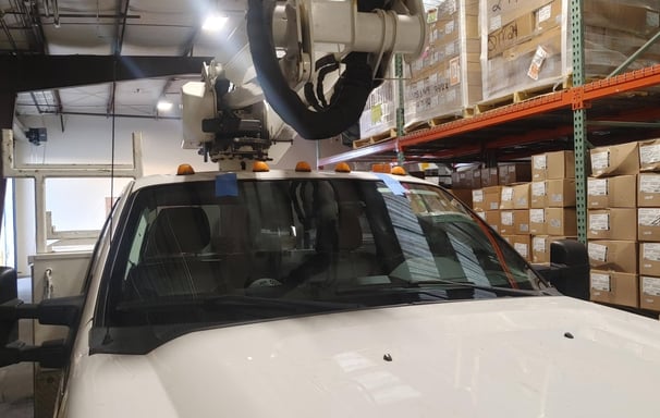 Service vehicle with a new windshield
