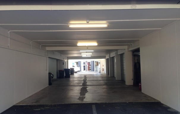 a parking lot with a parking lot and a parking lot