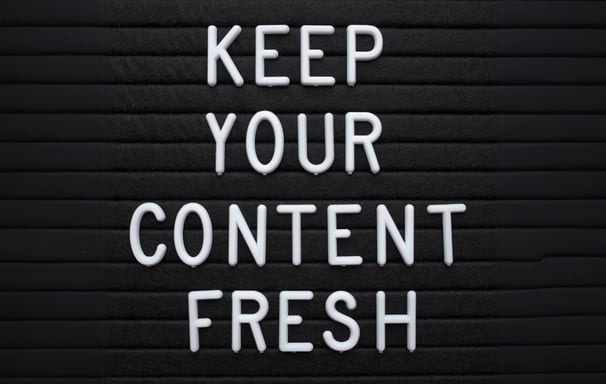 Lettering says Keep your content fresh, used to represent content creation services.