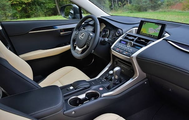 a car dashboard with a steering wheel and dashboard