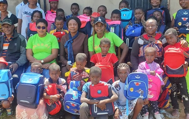 Nseni offers didactic materials to pupils in community schools in Bali