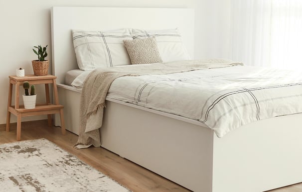 clean bedroom and made bed