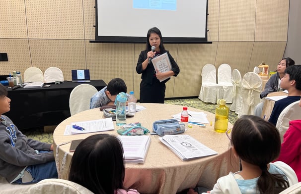 Thriving Kids Club Founder Mrs Serene Wee and students at Intensive English Bootcamp