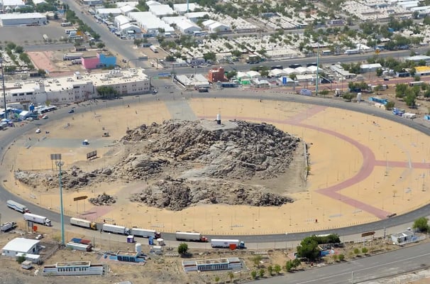 a large pile of rubble in a city