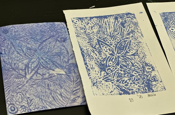 styrofoam block printing plate and print on paper laying on a table