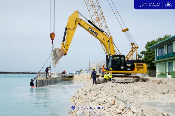 a crane is being lifted by a crane