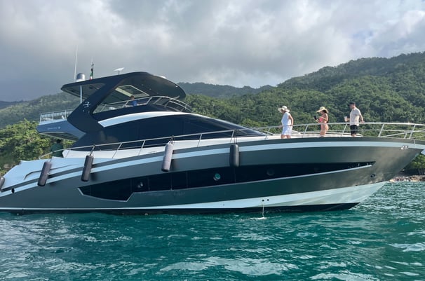a boat with people on it in the water