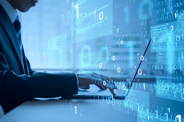 Developer creating tailored custom-built software on laptop
