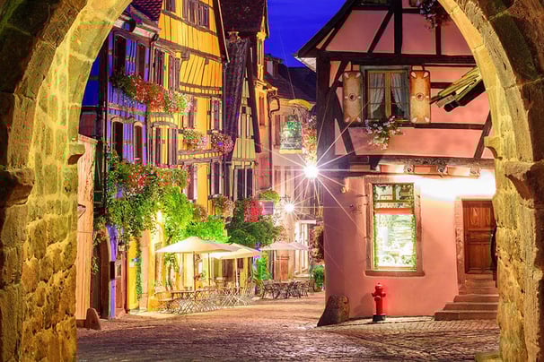 Alsace village Riquewihr colored house cobble night