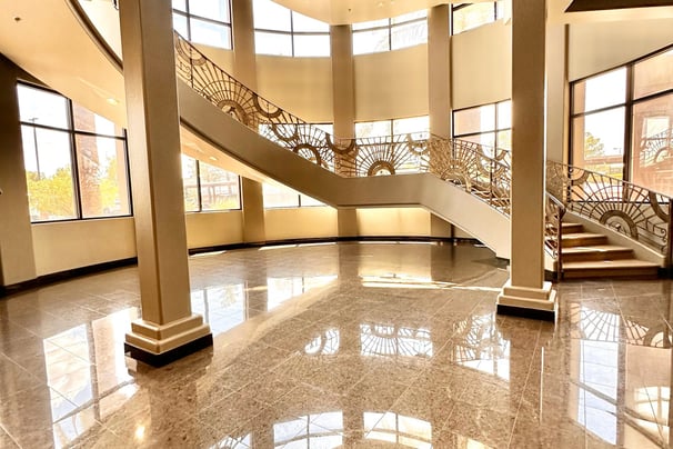 a large room with a staircase and a staircase