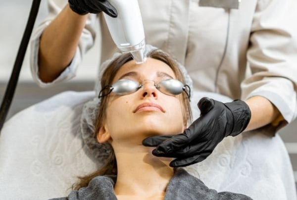 woman getting Laser Therapy on her face