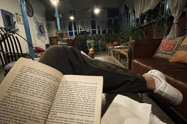 Me again. Reading on the peaceful terrace of the hostel where I stayed.