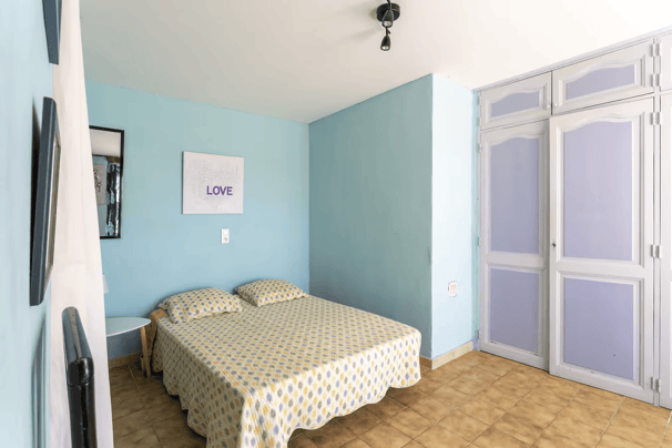 a bedroom with a bed and a bed in it