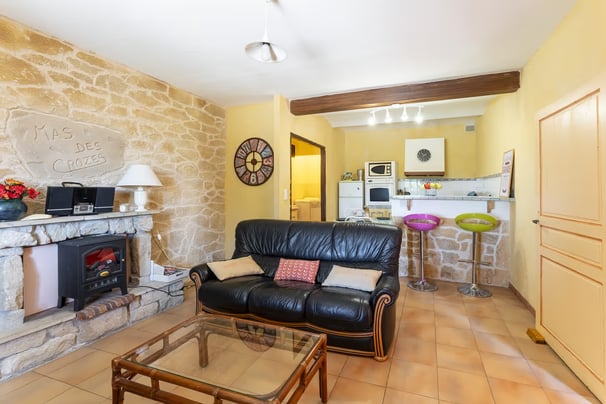 a living room with a couch and a table