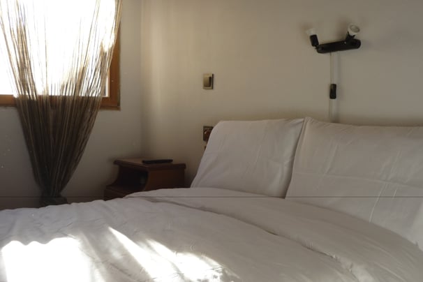 Bedroom Liopraso Nakou's house warm decor relax from a busy day 