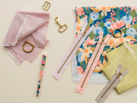 a bunch of sewing supplies on a table