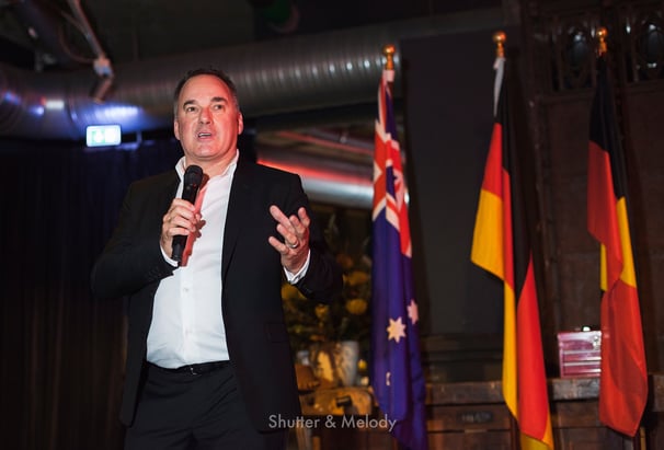 Graeme Mason speaking to guests at a Berlinale event.